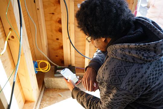 man looking at phone