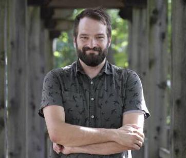 photo of man with beard and dress shirt